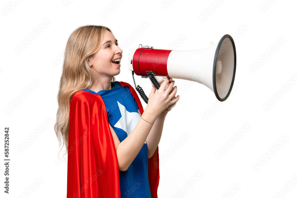 Super Hero English woman over isolated background shouting through a megaphone Super Hero English woman over isolated background shouting through a megaphone