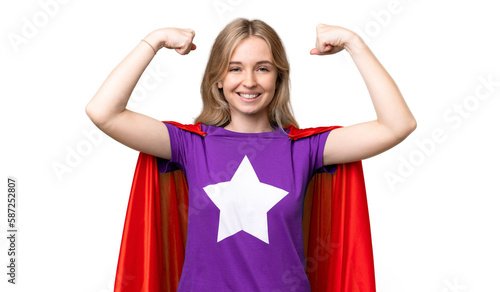 Young English woman over isolated background in superhero costume and doing strong gesture