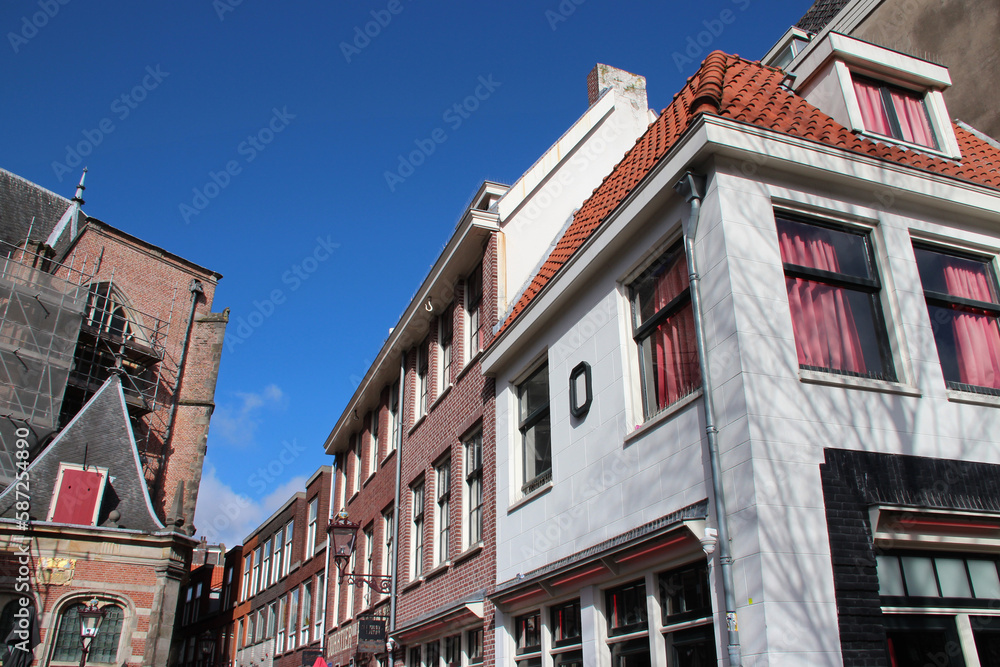 old church (oude kerke) and houses in amsterdam (the netherlands) 