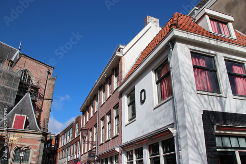 old church (oude kerke) and houses in amsterdam (the netherlands) 