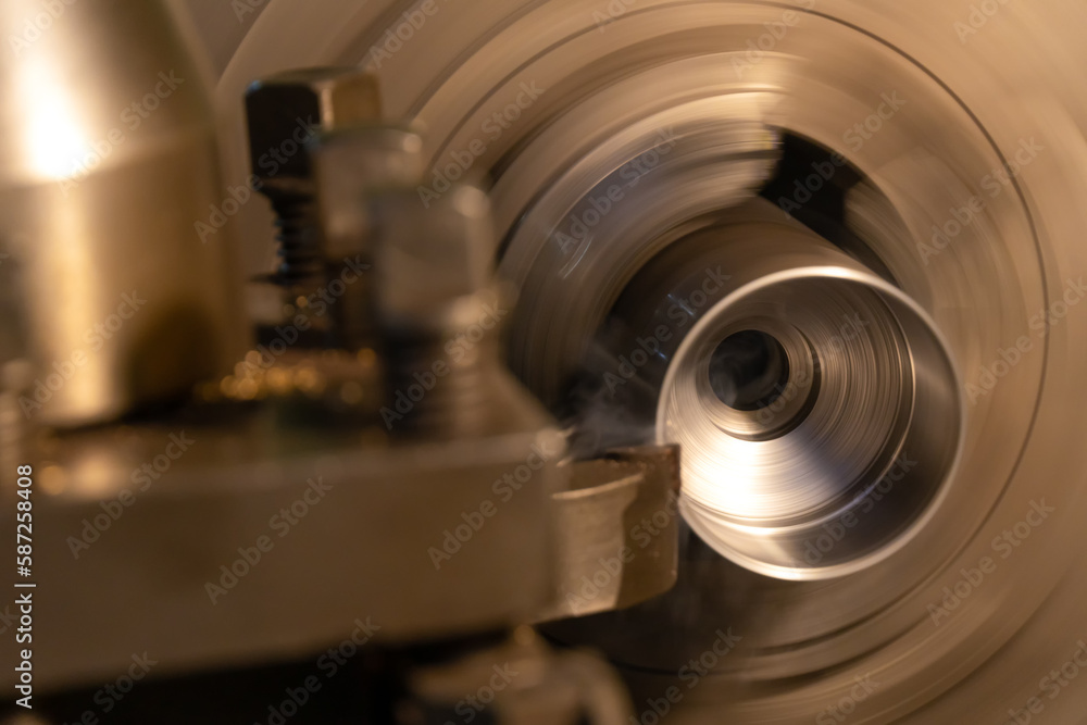 Industry milling mechanical turning metalworking metalworking of metal parts, production of industrial Lathes for cutting metal parts shafts with lathe tools. Metalworking process with lathe.