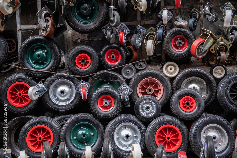 Wheelbarrow wheels of different sizes. Wheels of different colors and