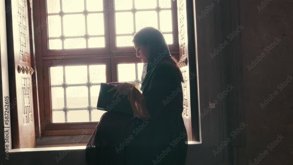 Muslim Woman Reading Koran In Mosque Muslim Woman Reading Koran In Mosque