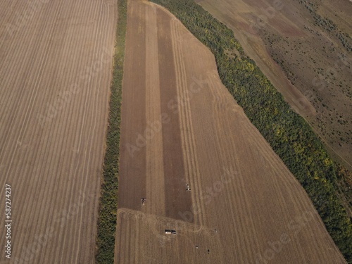 summer harwesting corn farm field ukraine 2022 photo