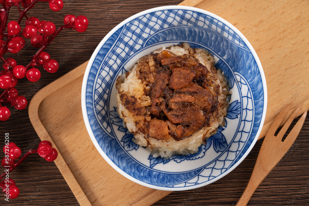 Migao, tube rice cake, rice pudding in a bowl, delicious Taiwanese street food. Migao, tube rice cake, rice pudding in a bowl, delicious Taiwanese street food.