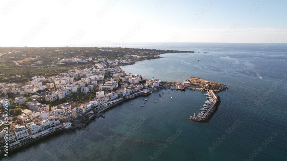 Aerial view of the city of Chersonissos along the coastline of the Aegean sea in Crete.