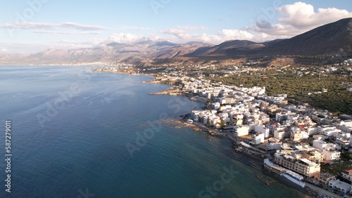 Aerial view of the city of Chersonissos along the coastline of the Aegean sea in Crete.