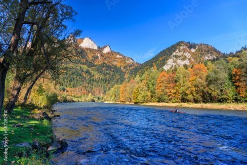 Rafting down the Dunajec River in the autumn scenery of the Pieniny Mountains. Poland