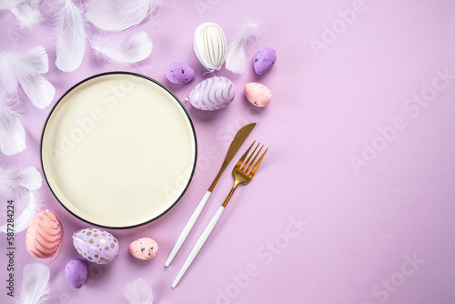 Easter food background on purple background. Happy Easter holiday concept