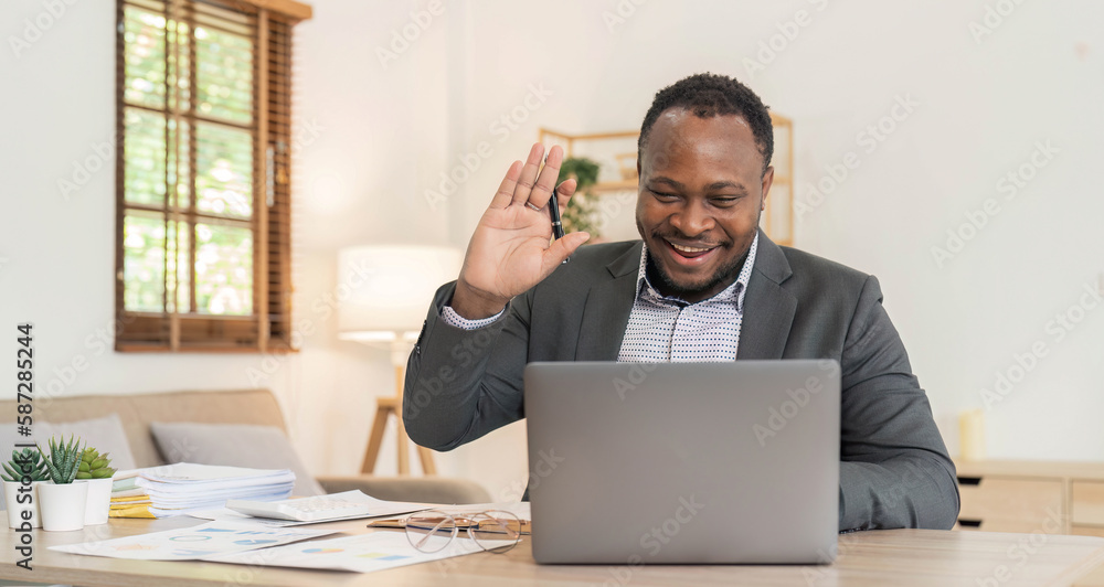 Financial analyst using laptop to attend video call meeting in workplace. Office worker talking on remote videoconference chat for online telecommunication, telework conference. Financial analyst using laptop to attend video call meeting in workplace. Office worker talking on remote videoconference chat for online telecommunication, telework conference.
