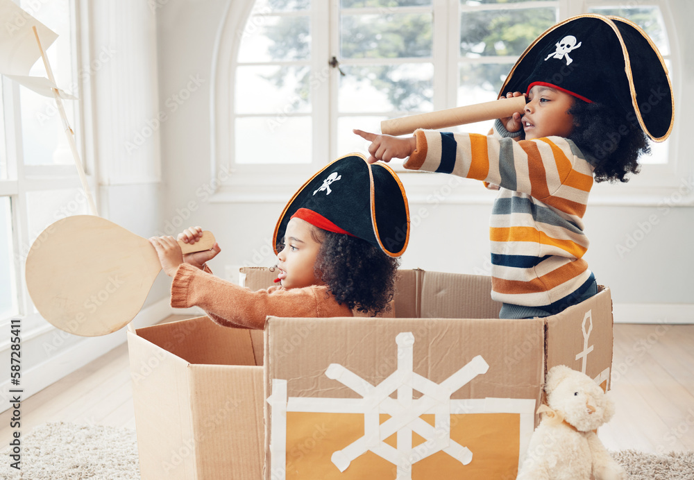 Fototapeta premium Pirate, box and playing with children in living room for bonding, imagine and creative. Happy, youth and siblings with girls sailing in cardboard ship in family home for relax, fantasy and games