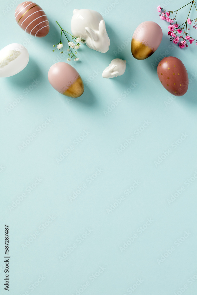 Happy Easter vertical banner design, poster template. Frame top border made of Easter eggs, flowers, bunnies on pastel blue background Happy Easter vertical banner design, poster template. Frame top border made of Easter eggs, flowers, bunnies on pastel blue background