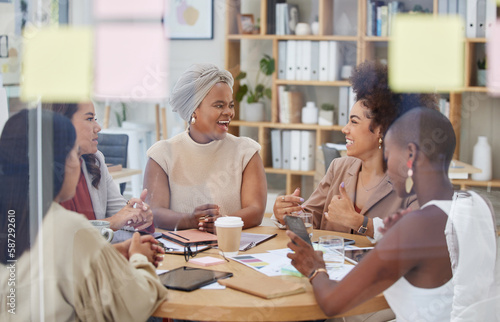 Collaboration, meeting and management with business women in an office, talking strategy as a team. Teamwork, planning or partnership with a colleague group in discussion at work through glass