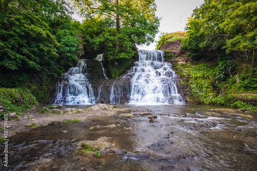 View on Dzhurynskyi waterfall near Nyrkiv village in region of Zalischyky, Ukraine photo