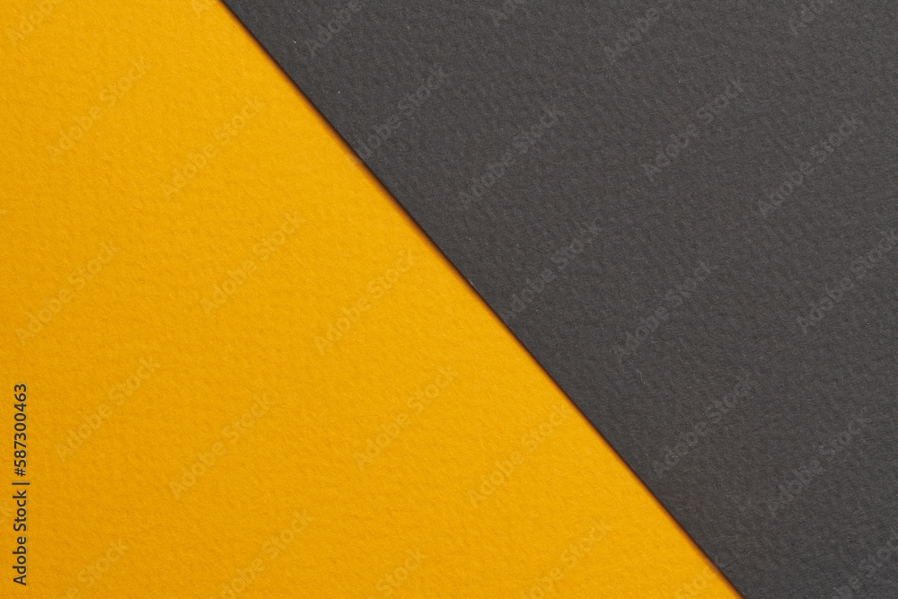 Rough kraft paper background, paper texture black yellow colors. Mockup with copy space for text Rough kraft paper background, paper texture black yellow colors. Mockup with copy space for text
