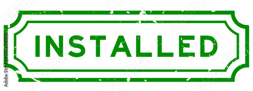 Grunge green installed word rubber seal stamp on white background