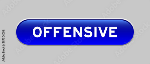 Blue color capsule shape button with word offensive on gray background