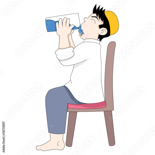 boy is sitting drinking a glass of water for breaking fast of ramadan islam