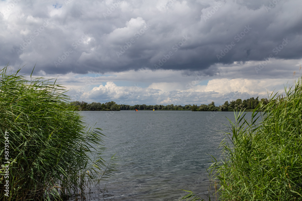 Lake with dramatic sky in summer