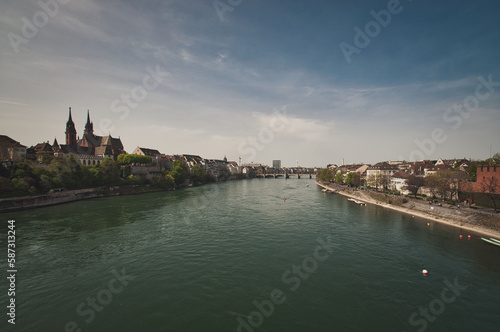 Beautiful architecture of Basel, Switzerland, at the River Rhine on a sunny day © codebude