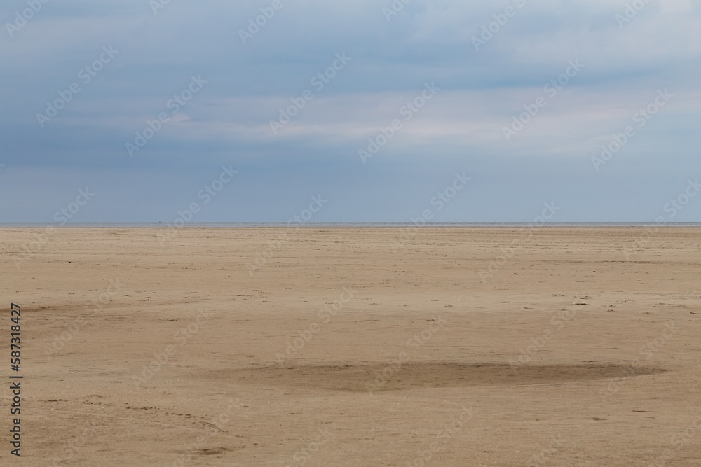 Dune landscape overlooking a beach in St. Peter-Ording, North Friesland, Schleswig-Holstein, Germany, Europe Dune landscape overlooking a beach in St. Peter-Ording, North Friesland, Schleswig-Holstein, Germany, Europe