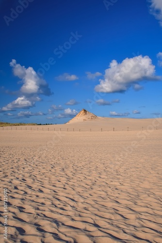 Beautiful holiday seaside landscape. Moving dunes in the desert in Slowinski National Park in Leba  Poland.