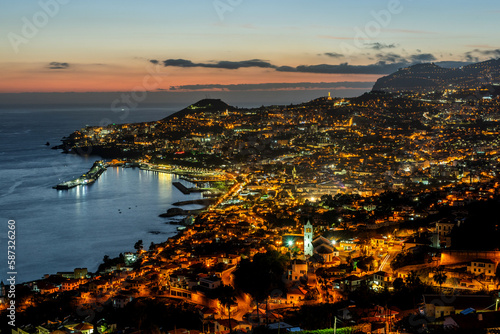 Illuminated cityscape of Funchal, Madeira after sunset at twilight
