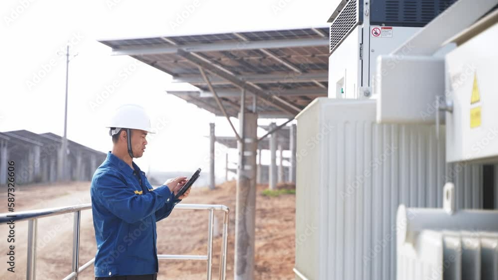 technician using tablet with eletricity industry technician using tablet with eletricity industry