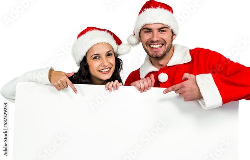 Festive couple showing poster