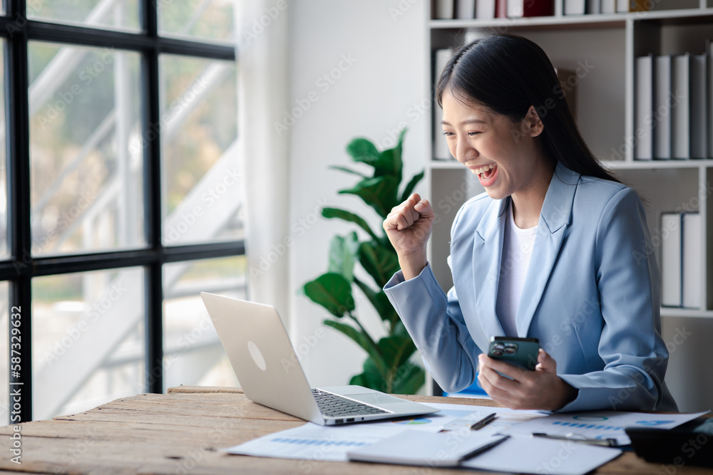 A businesswoman is checking company financial documents and using a tablet to talk to the chief financial officer through a messaging program. Concept of company financial management. A businesswoman is checking company financial documents and using a tablet to talk to the chief financial officer through a messaging program. Concept of company financial management.