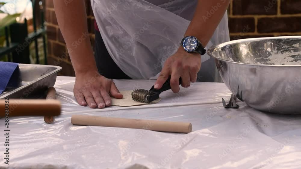 Kids cooking, roll out the dough and making matzah for Jewish holiday Passover Pesach at culinary master class for children outdoor in park. Kids cooking, roll out the dough and making matzah for Jewish holiday Passover Pesach at culinary master class for children outdoor in park.