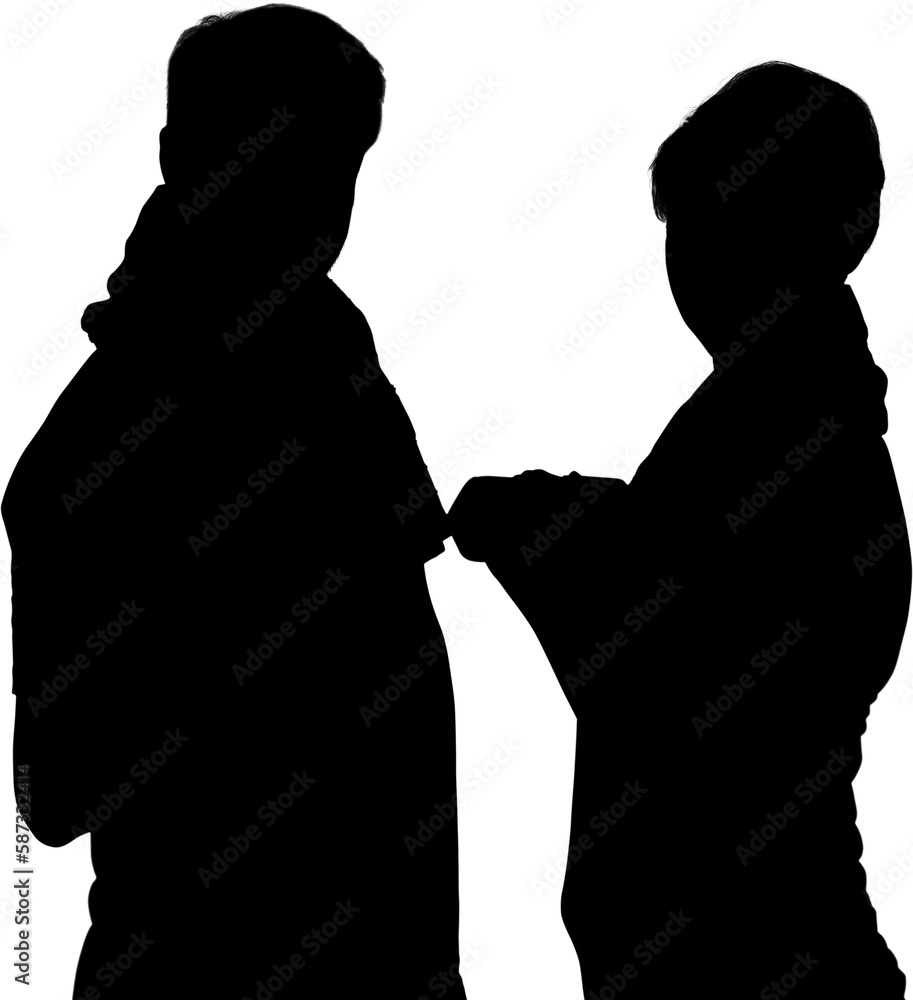 Silhouette couple holding bottle while standing face