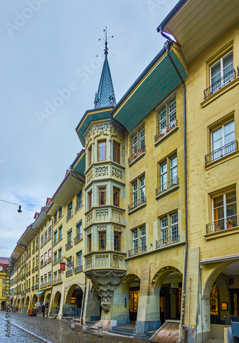 The scenic building on Munstergasse street with ornate balcony, Bern, Switzerland photo