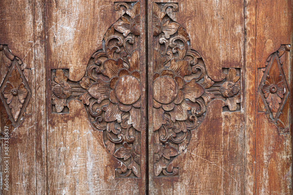Balinese wood carved door detail background and wallpaper texture Stock