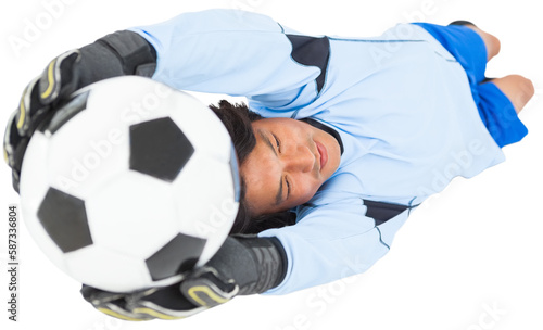 Goalkeeper holding ball while lying down