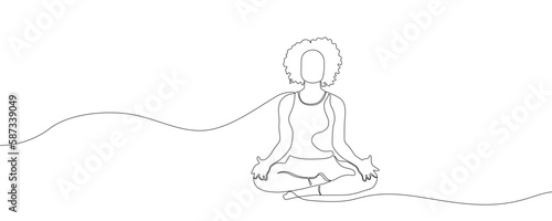 Woman sitting in lotus yoga pose. Continuous one line drawing on white background. Vector illustration