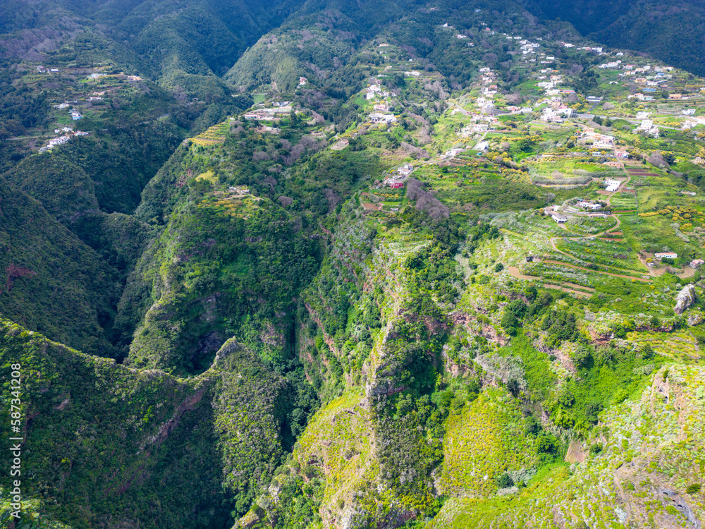 A volcanic gorge covered with dense green vegetation. La Galga, La Palma, Canary Islands, Spain.