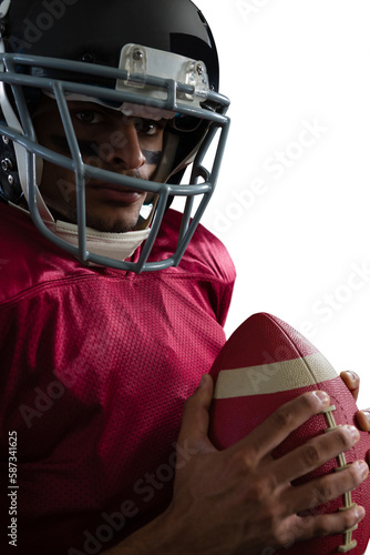Portrait of determined American football player with ball © vectorfusionart