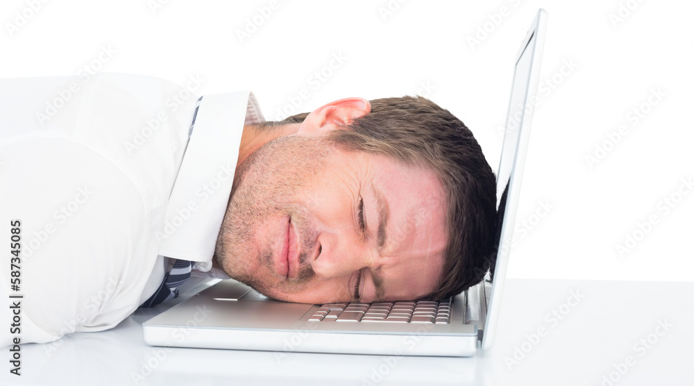 Tired businessman resting on laptop Tired businessman resting on laptop