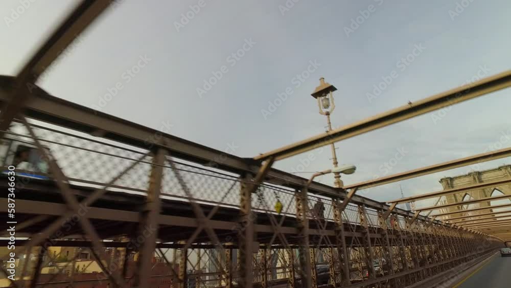 Pov Shot Of Cars Moving On Brooklyn Bridge Under Sky In City - New York City, New York Pov Shot Of Cars Moving On Brooklyn Bridge Under Sky In City - New York City, New York