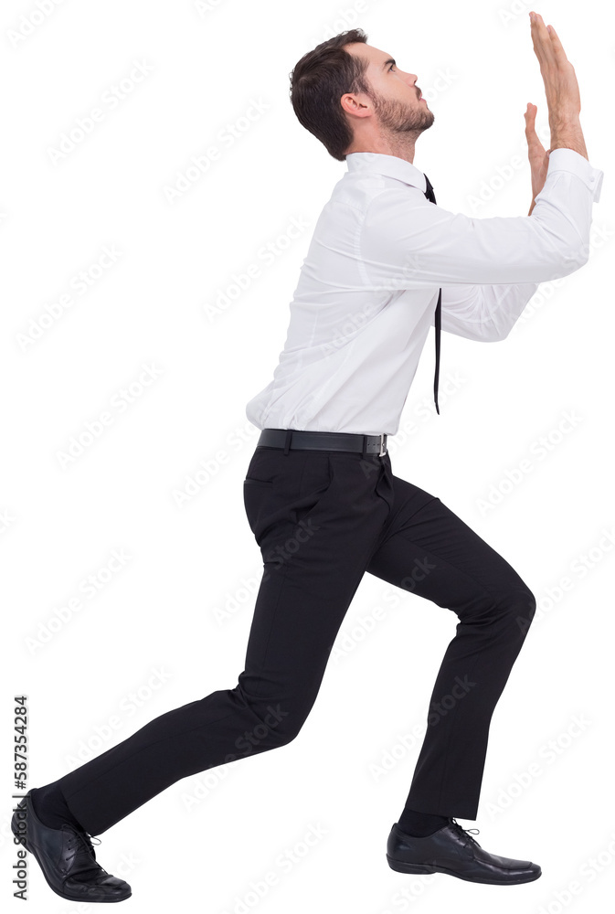 Businessman standing with bent legs and pushing Businessman standing with bent legs and pushing