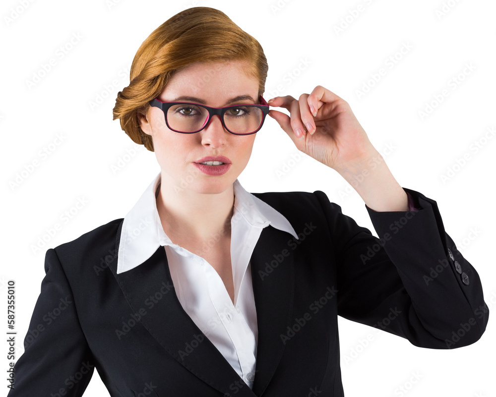 Redhead businesswoman touching her glasses Redhead businesswoman touching her glasses
