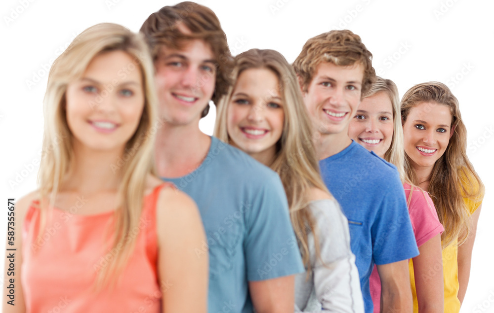 A smiling group standing behind each other at an angle A smiling group standing behind each other at an angle