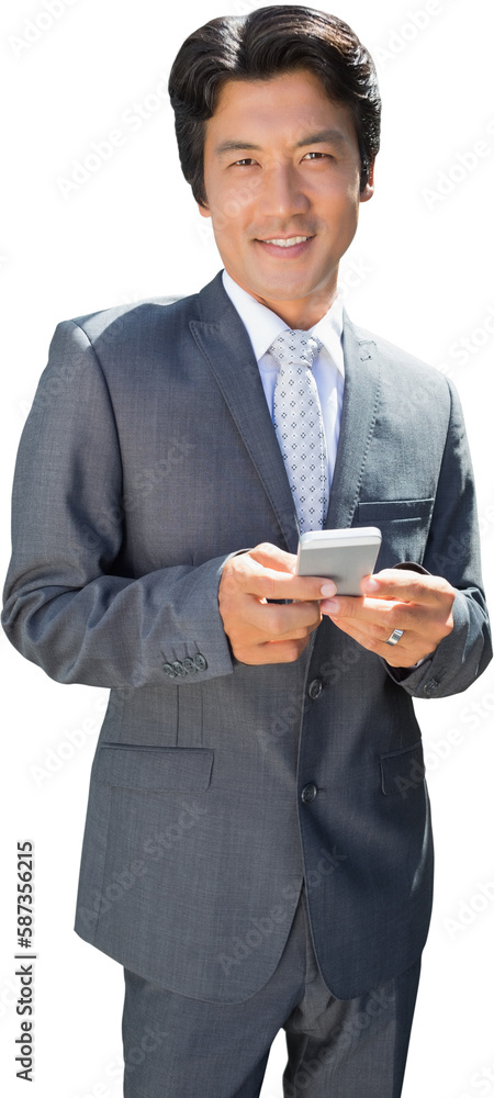 Obraz premium Confident estate agent standing at front door texting