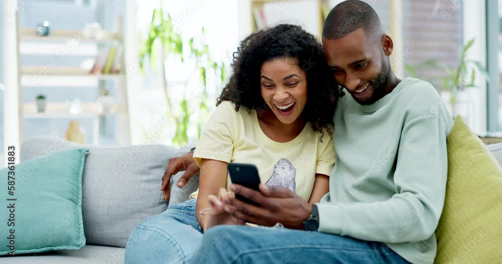Couple, phone and laughing on sofa in home at comedy, joke or comic meme online. Interracial, cellphone and happiness of black man and woman relax on couch in lounge on social media, funny or humor. Couple, phone and laughing on sofa in home at comedy, joke or comic meme online. Interracial, cellphone and happiness of black man and woman relax on couch in lounge on social media, funny or humor.