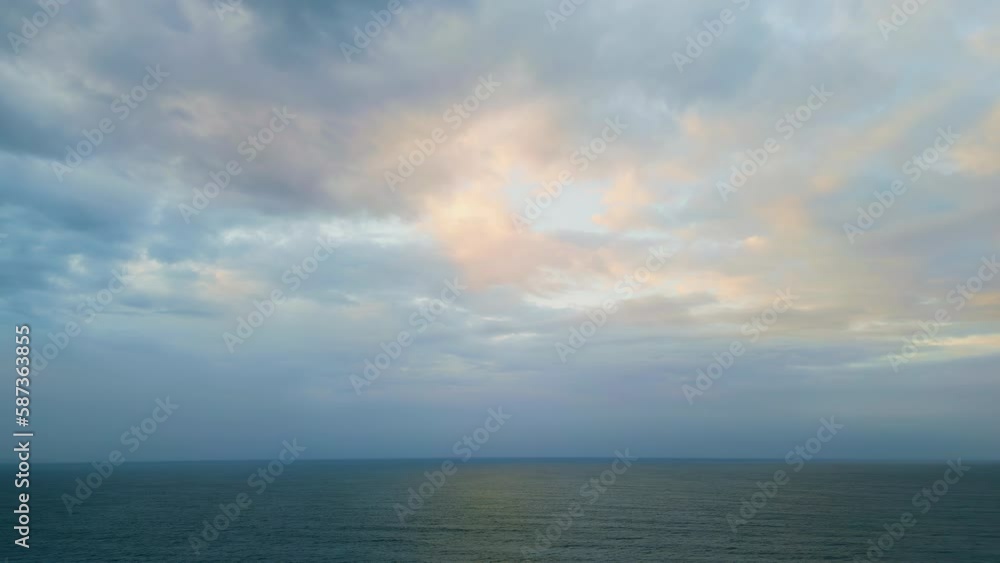 Dramatic sky dark ocean at twilight. Aerial rays breaking clouds over sea water. Dramatic sky dark ocean at twilight. Aerial rays breaking clouds over sea water.