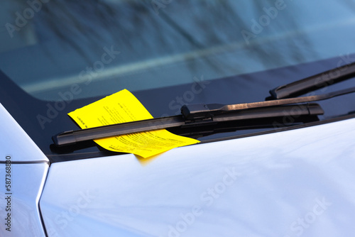 Fine under the car wiper. Penalty for incorrect car parking