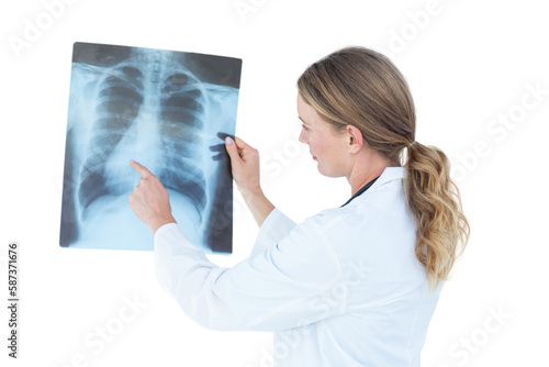 Focused doctor looking at xray 