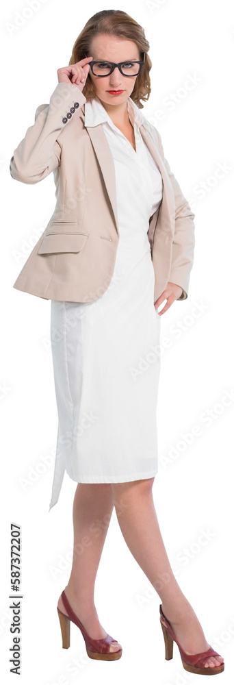 Severe pretty businesswoman looking at camera Severe pretty businesswoman looking at camera
