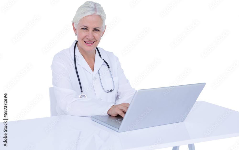 Portrait of smiling female doctor using laptop Portrait of smiling female doctor using laptop